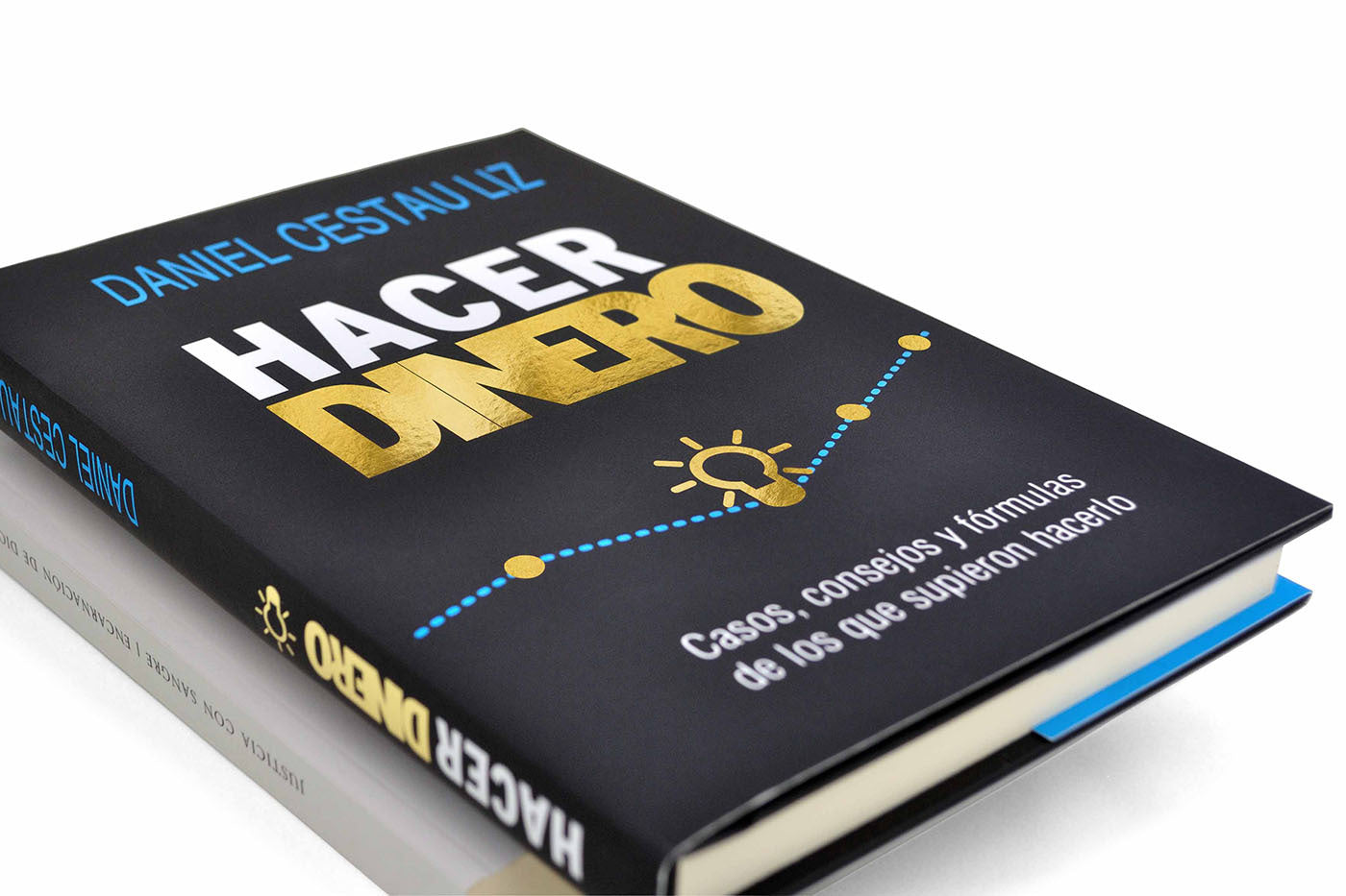 Portada de libro "Hacer dinero" con foil dorado.